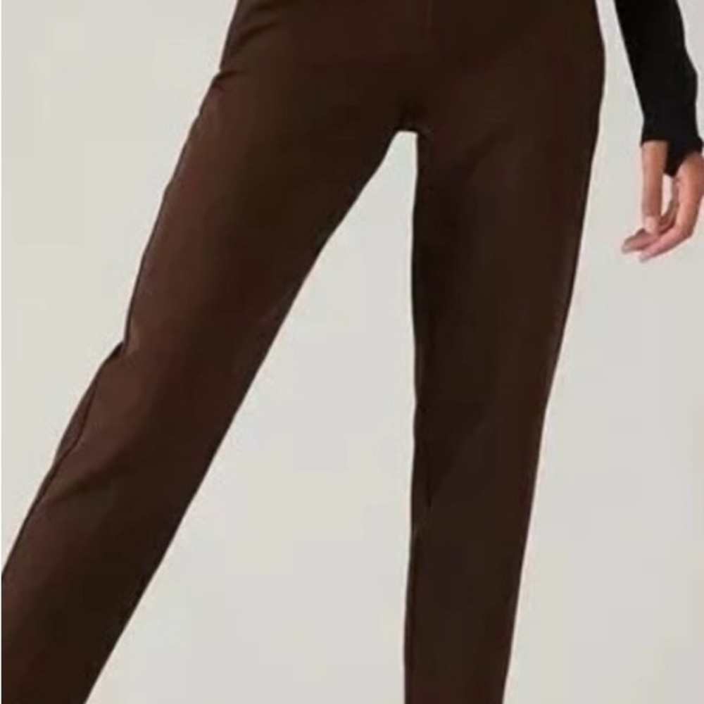 Athleta Endless pants, new without tags. Brown. Front zipper pockets.